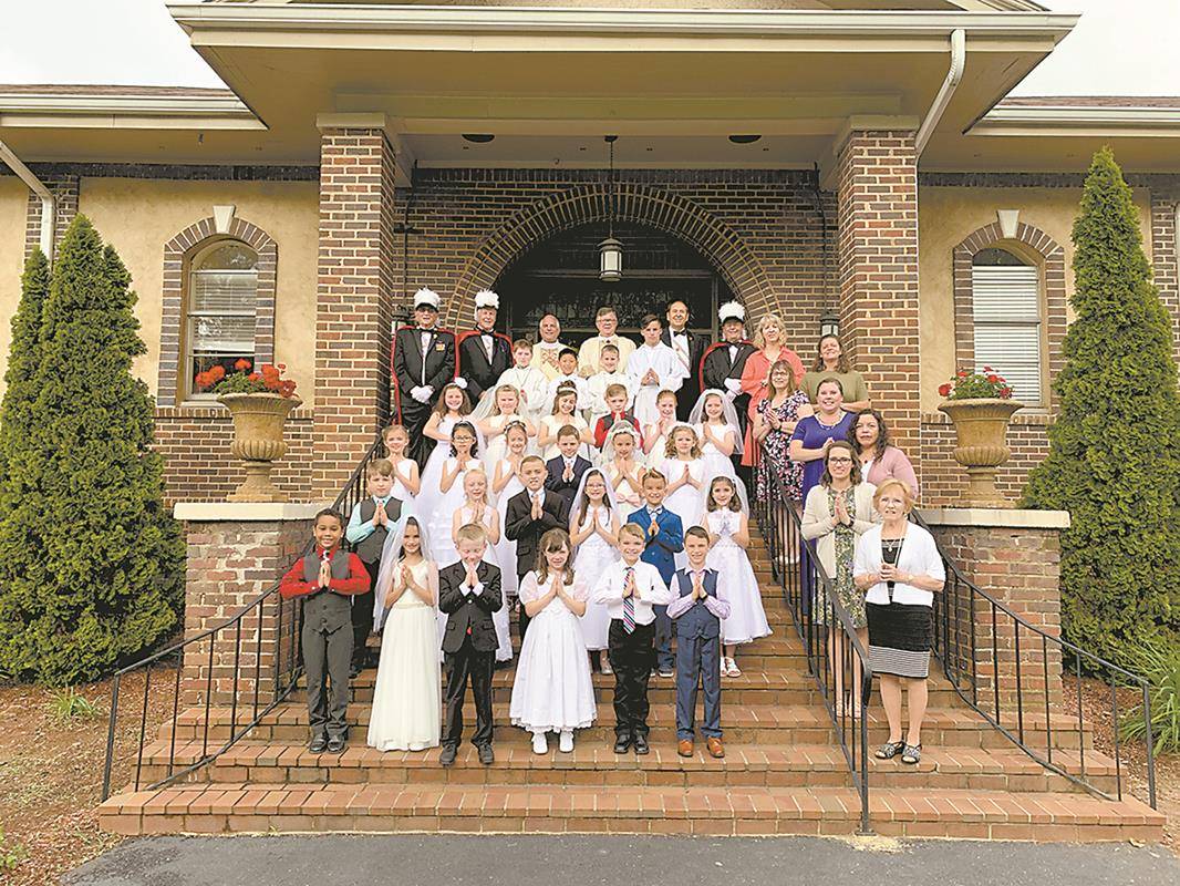 Twenty-four children received their first Holy Communion at Holy Spirit Church in Denver during Mass May 4. (Photo provided by Nicole Waer)