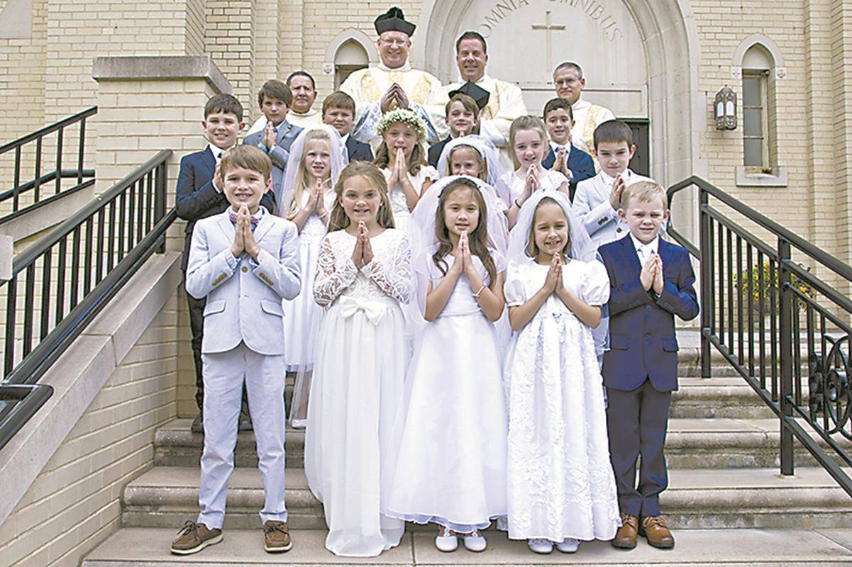 Thirty-one children at St. Patrick Cathedral in Charlotte received their first Holy Communion during Masses celebrated May 4 and May 11. (Photos provided by James Sarkis)