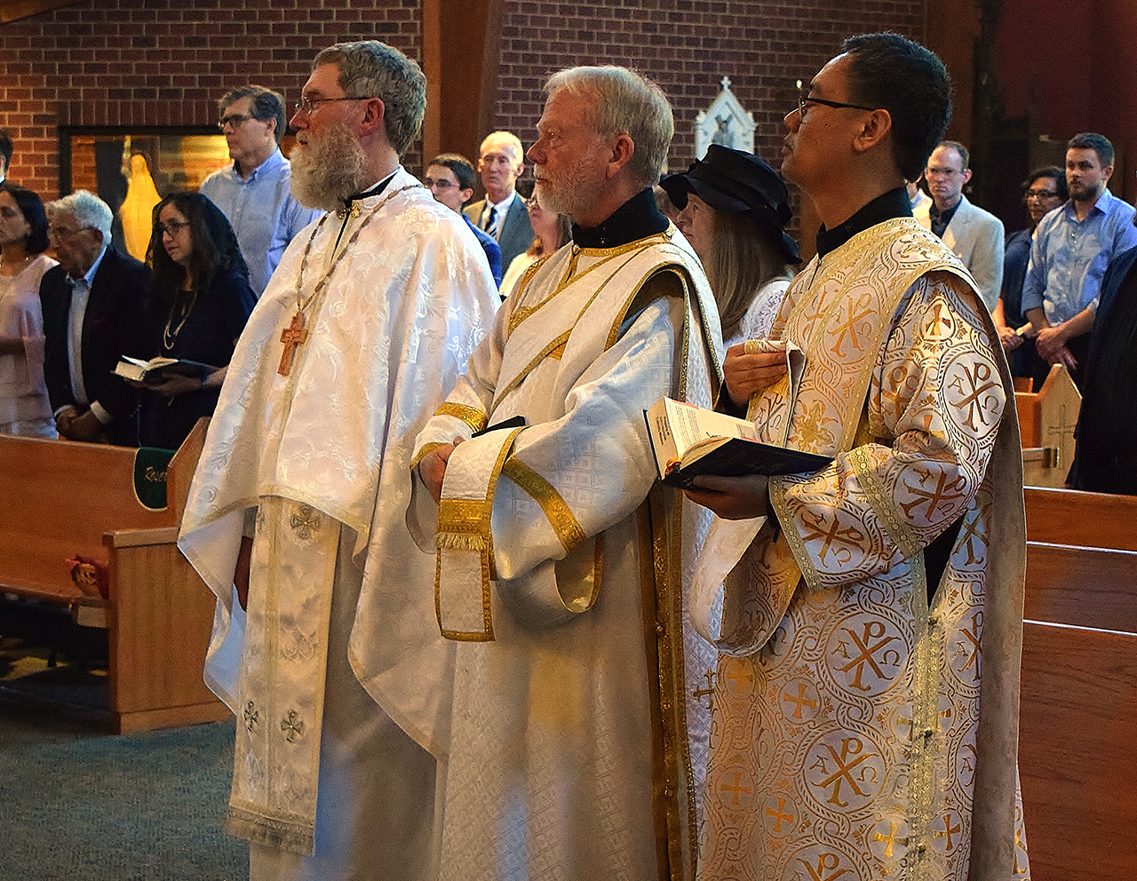 (From left) Father Kevin, Deacon David and Deacon Basilius at the Divine Liturgy. (Della Sue Bryson)