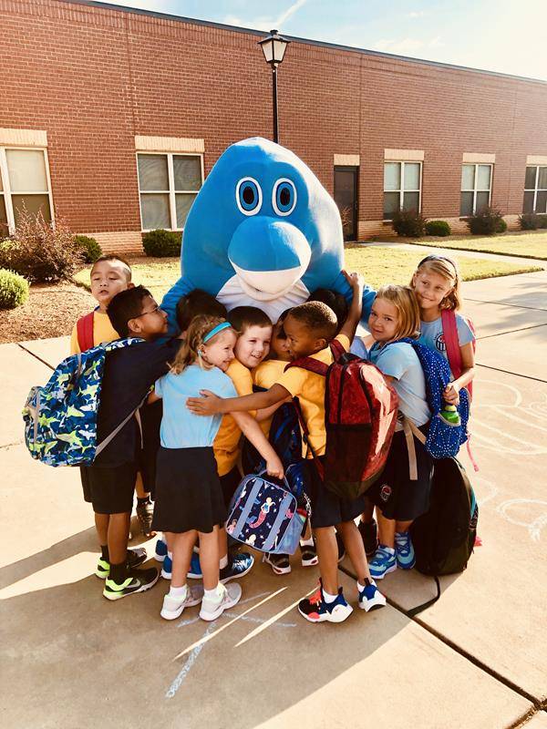 SALISBURY — Kindergartners headed back to school at Sacred Heart in Salisbury Aug. 7 by celebrating with the school mascot, Fin. (Photos provided by Tyler Kulp.)