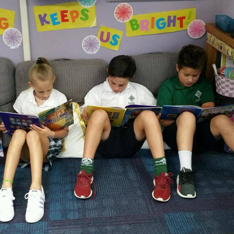 CHARLOTTE — Students spent time with prayer partners and reading during the first few weeks of school at St. Patrick School in Charlotte. (Photos via Facebook)