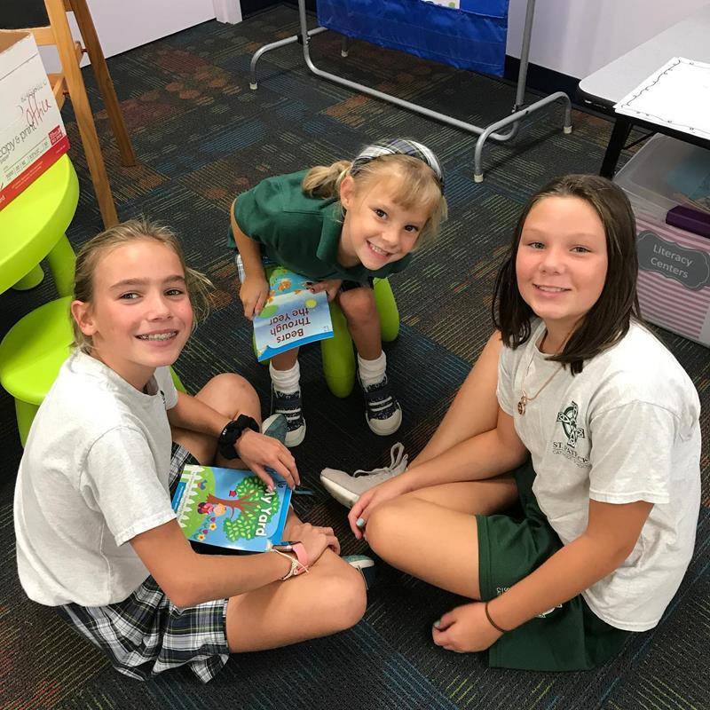 CHARLOTTE — Students spent time with prayer partners and reading during the first few weeks of school at St. Patrick School in Charlotte. (Photos via Facebook)