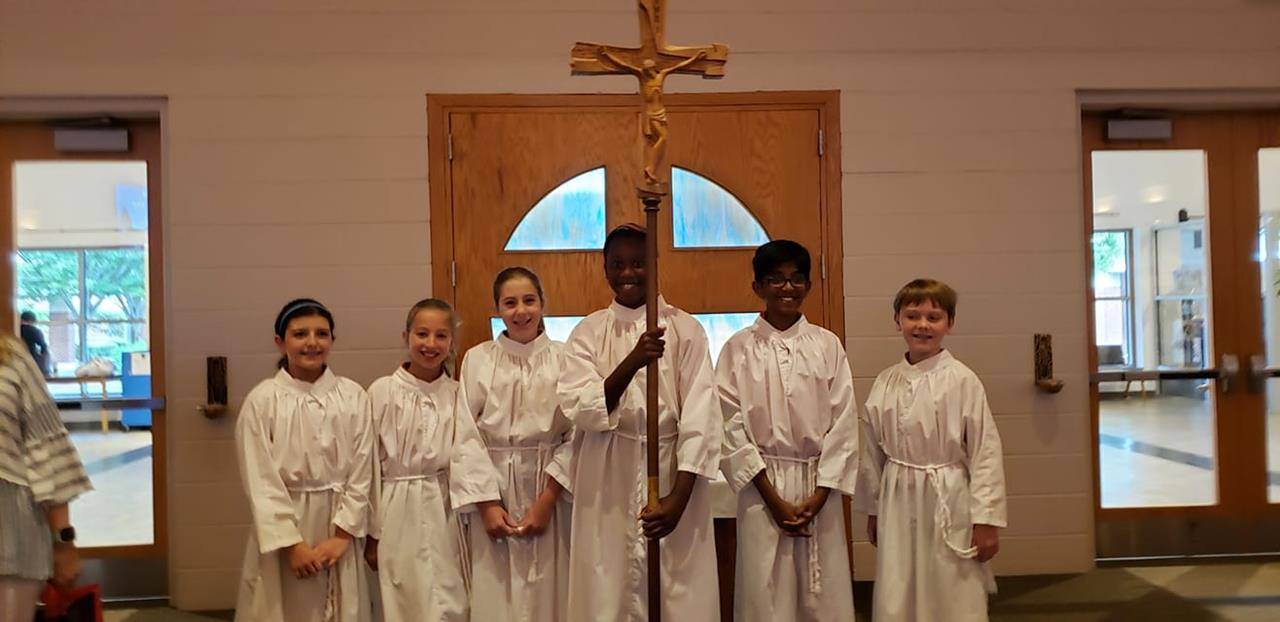 CHARLOTTE —The first Mass of the school year at St. Matthew School. (Photos via Facebook)