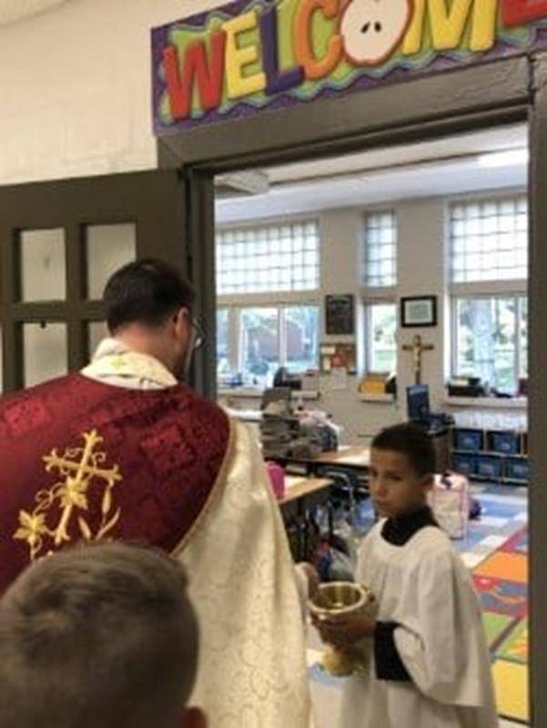 GASTONIA — Students at St. Michael School in Gastonia had a great first day of school on Sept. 3. Father Lucas Rossi blessed the school. (Photos via Facebook)