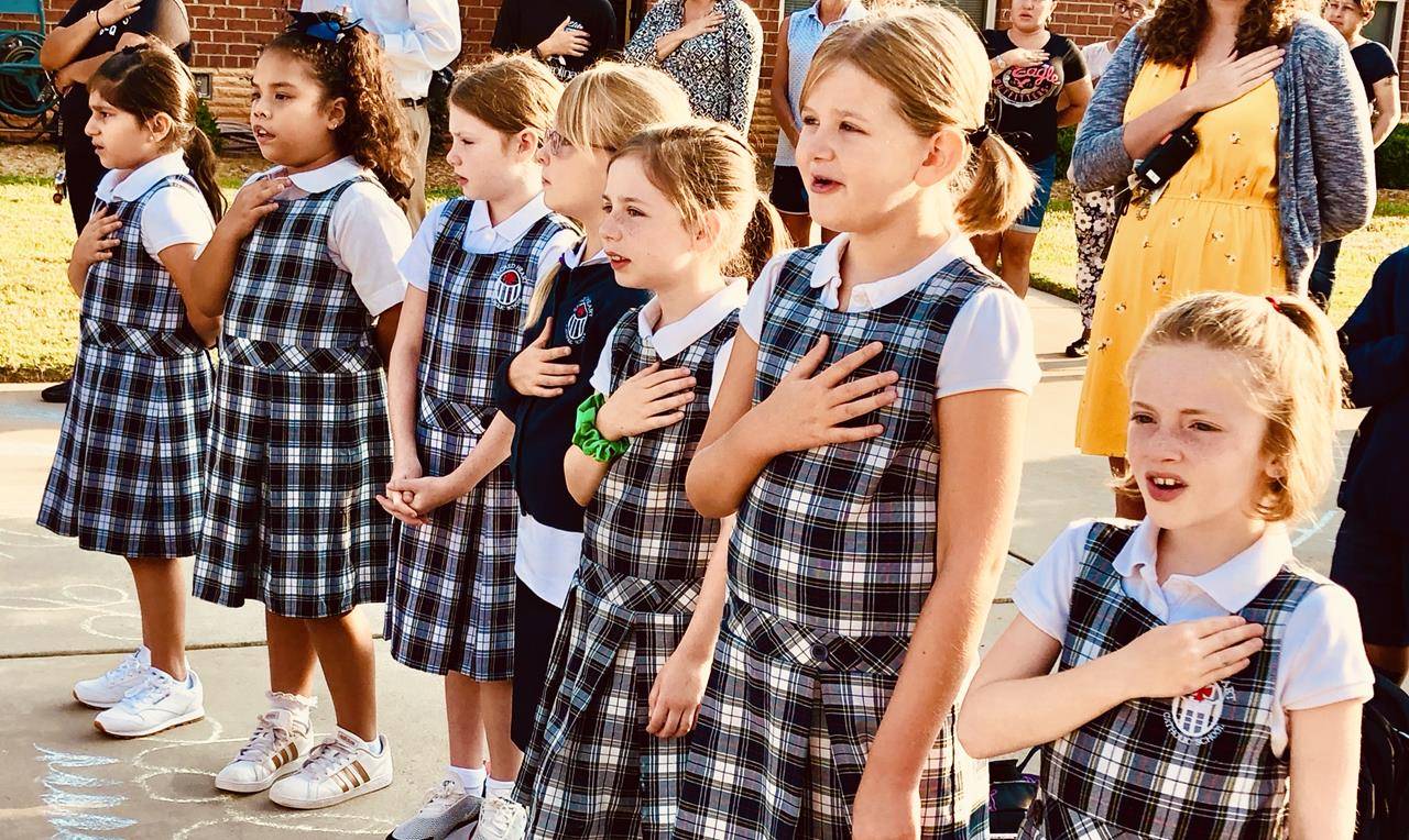 SALISBURY — Kindergartners headed back to school at Sacred Heart in Salisbury Aug. 7 by celebrating with the school mascot, Fin. (Photos provided by Tyler Kulp.)