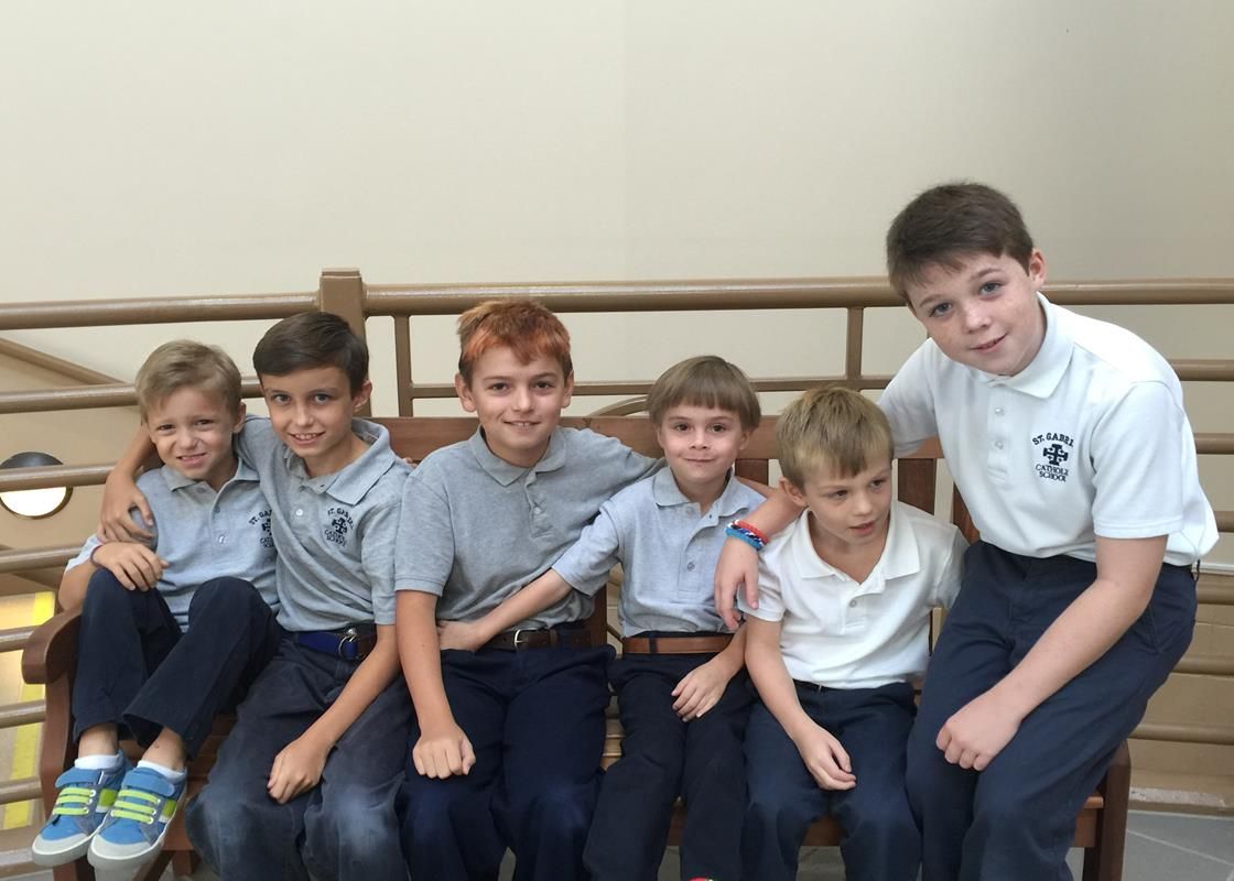 Fifth Grade students at St. Gabriel in Charlotte with their kindergarten  prayer partners.