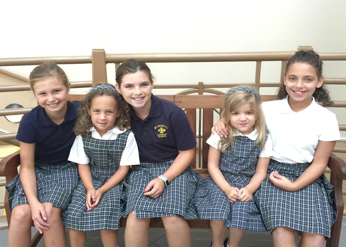 Fifth Grade students at St. Gabriel in Charlotte with their kindergarten  prayer partners.