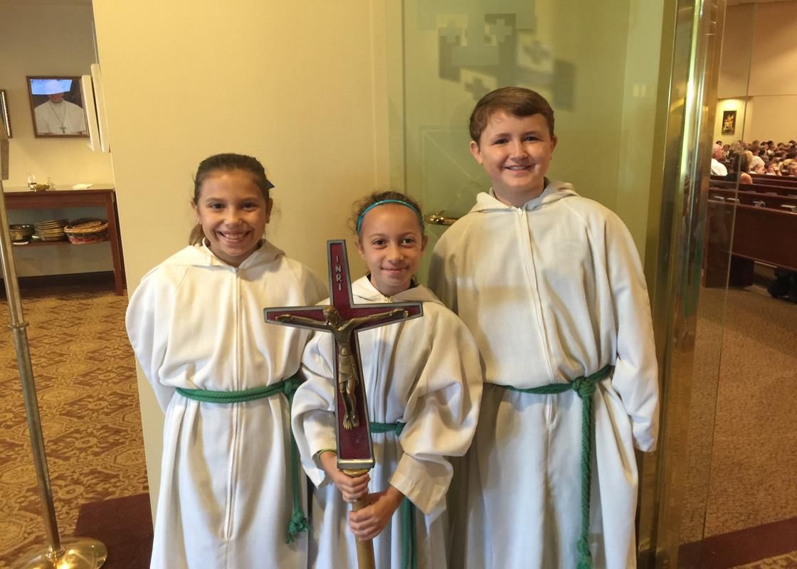 Getting ready for Mass at St. Gabriel School.