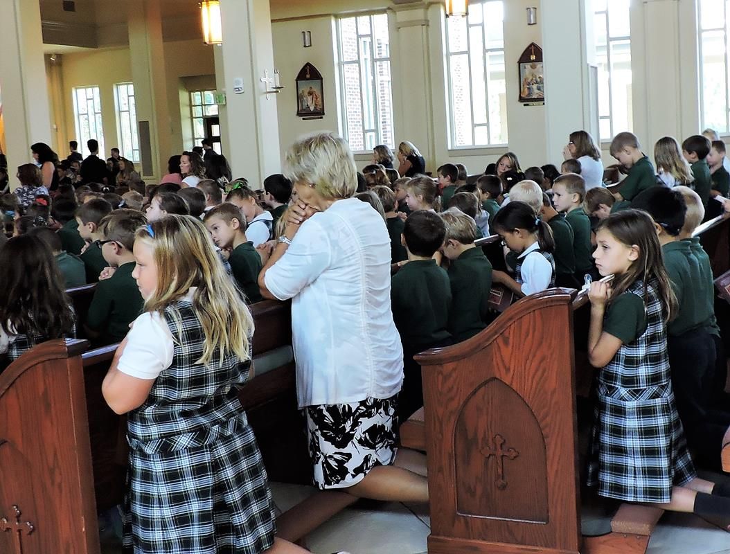 Principal Debbie Butler at the all-school Mass.