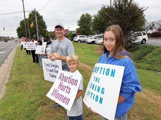 HICKORY — St. Aloysius' parishioners and other churches, took an hour out of their day to challenge Hickory to respect all human life from conception to natural death. (Photo provided by Bobby Spears)