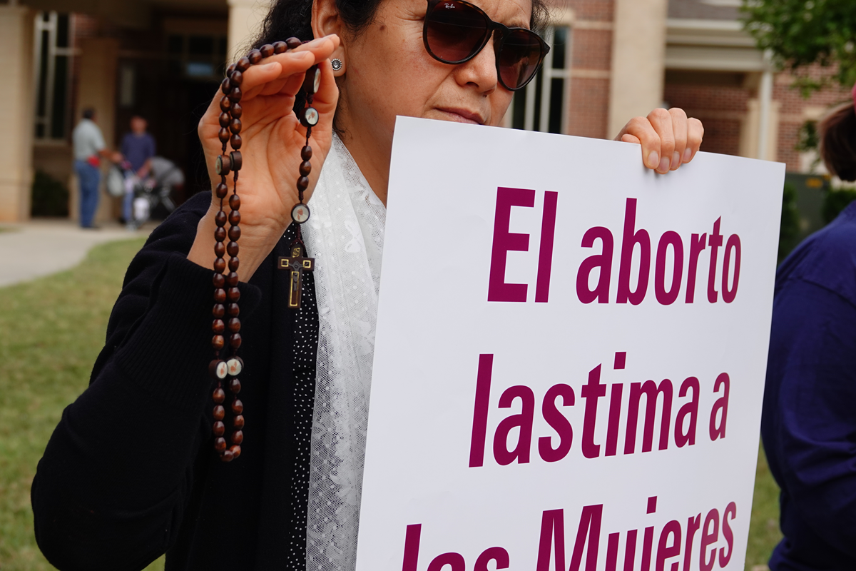 HUNTERSVILLE — More than 200 joined in a Life Chain along the sidewalk in front of St. Mark Church Oct. 6. After the Life Chain, the D3 Foundation Singers performed three of their pro-life songs. (Photos provided by Amy Burger)