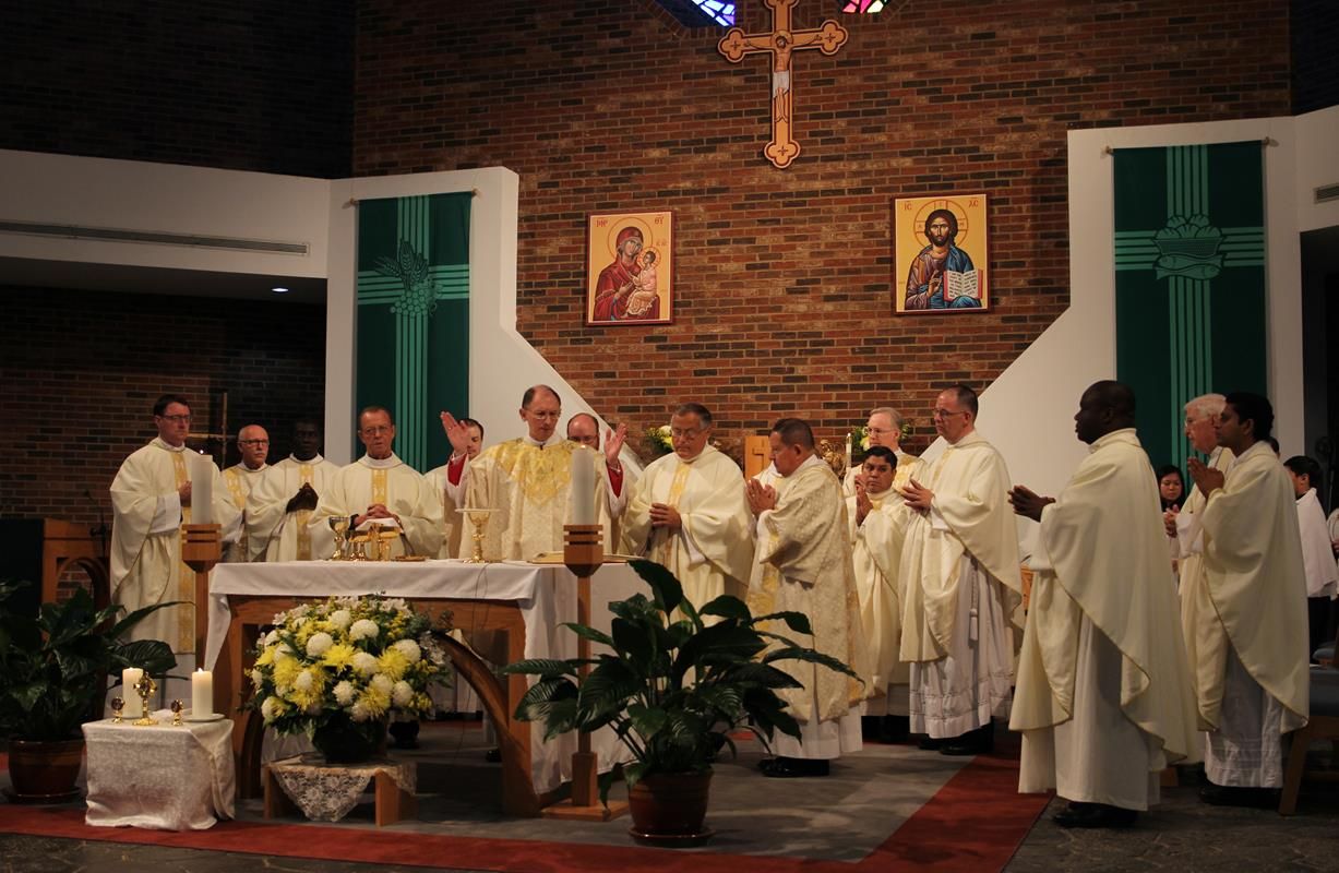 Bishop Peter Jugis, Bishop Emeritus William Curlin and 13 other priests concelebrated the Mass for St. Teresa of Calcutta