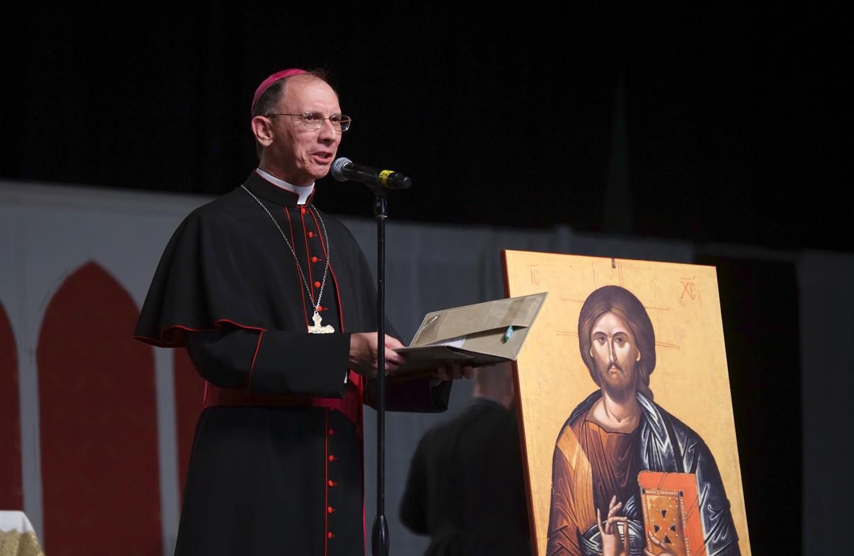 Bishop Peter Jugis welcomes Congress-goers at the start of the 12th annual Eucharistic Congress in Charlotte