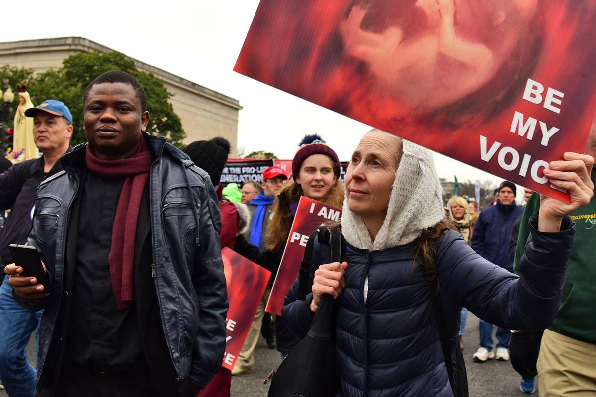 mflf 66 - fr ernest and a parishioner (Copy)