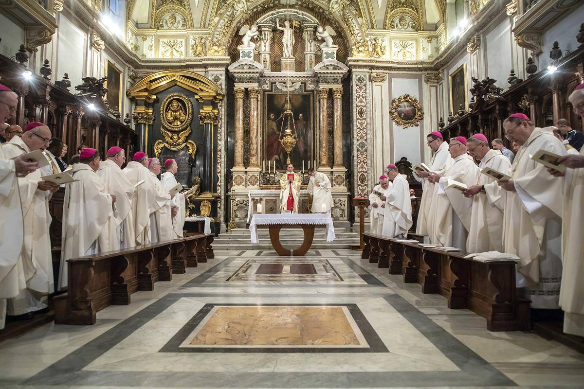 Bishop Peter J. Jugis of Charlotte, N.C., center, concelebrates Mass with U.S. bishops from Florida, Georgia, North Carolina and South Carolina at the Basilica of St. John Lateran in Rome Feb. 10, 2020. (CNS photo/Stefano Dal Pozzolo)