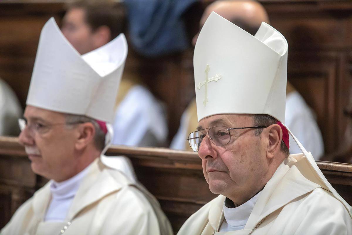 Bishop Luis R. Zarama Pasqualetto of Raleigh, N.C., and Bishop Robert E. Guglielmone of Charleston, S.C., concelebrate Mass with U.S. bishops from Florida, Georgia, North Carolina and South Carolina at the Basilica of St. John Lateran in Rome.