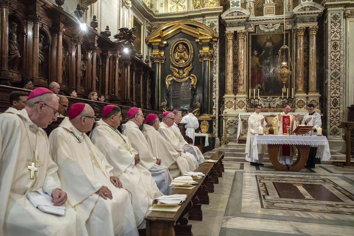 Bishop Peter J. Jugis of Charlotte, N.C., right, concelebrates Mass with U.S. bishops from Florida, Georgia, North Carolina and South Carolina at the Basilica of St. John Lateran in Rome Feb. 10, 2020. (CNS photo/Stefano Dal Pozzolo) 