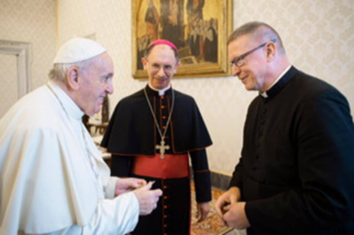 Cathedral of St. Patrick's Father Christopher Roux had the opportunity to meet with Pope Francis Father Roux presented the Pope with a copy of the 