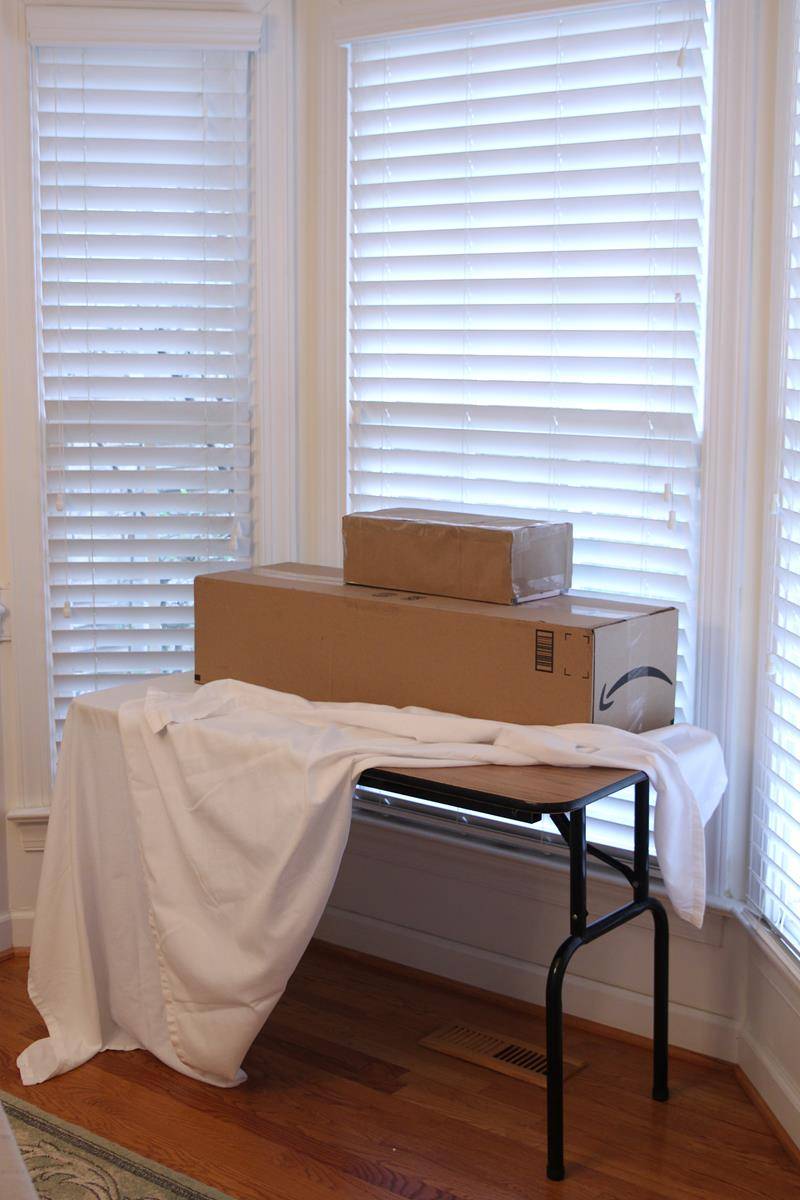 pic 1 empty table w boxes stacked copy