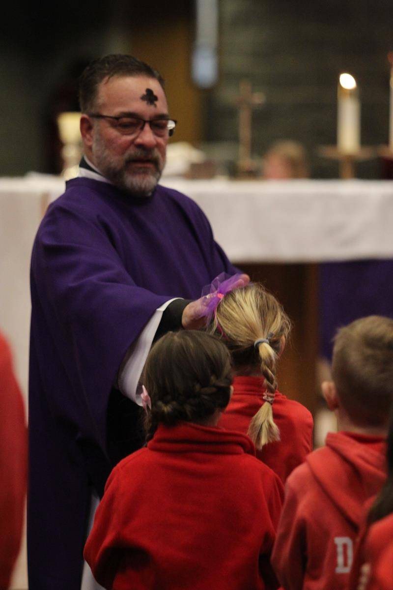 CHARLOTTE — St. Matthew School students participate in Ash Wednesday Mass at St. Matthew Church Feb. 26. (Photo by SueAnn Howell, Catholic News Herald.)