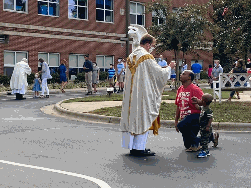 Outdoor Mass and Eucharistic Adoration at St. Gabriel Church in Charlotte. (Photo via Facebook)