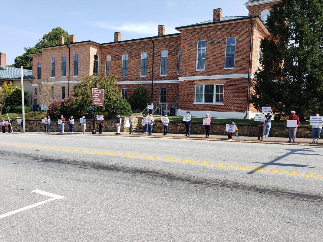 BREVARD — Parishioners from Sacred Heart Church participated in a Life Chain Oct. 4. More than 50 people participated in the Brevard Life Chain. (Photos provided by Nancy Elliott.)