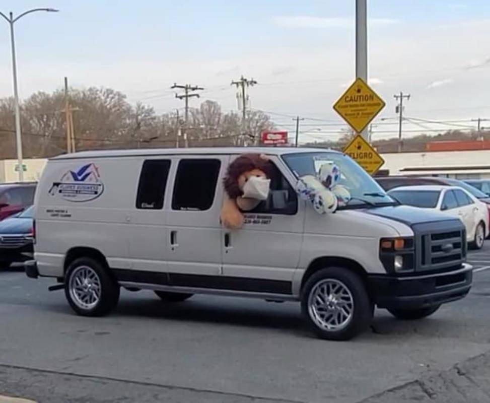 GREENSBORO — As part of the Catholic Schools Week celebration, Our Lady of Grace Schools students honored the local community by bringing flowers, thank you notes and fun drive-by parade for the Guilford County Health Department. (Photos via Facebook)