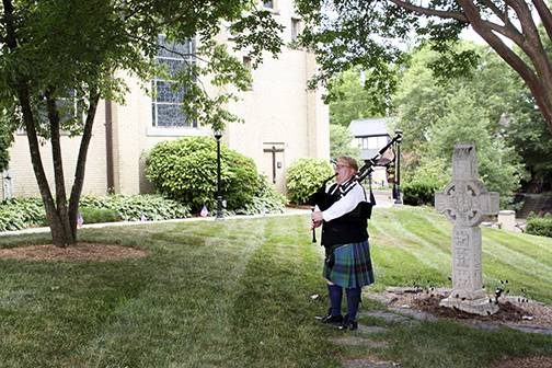 Bryan Somerville, a parishioner, also played bagpipes after the Memorial Day Mass. (Photos by Patricia Guilfoyle)