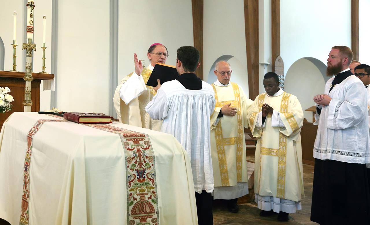 Bishop Jugis prays the prayers of commendation at the conclusion of the funeral Mass.