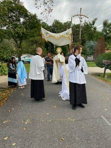 St. Mary Church in Sylva took Jesus to the parish neighborhood streets for a Eucharist Procession after a Votive Mass of the Most Holy Eucharist. (Photos via Facebook).