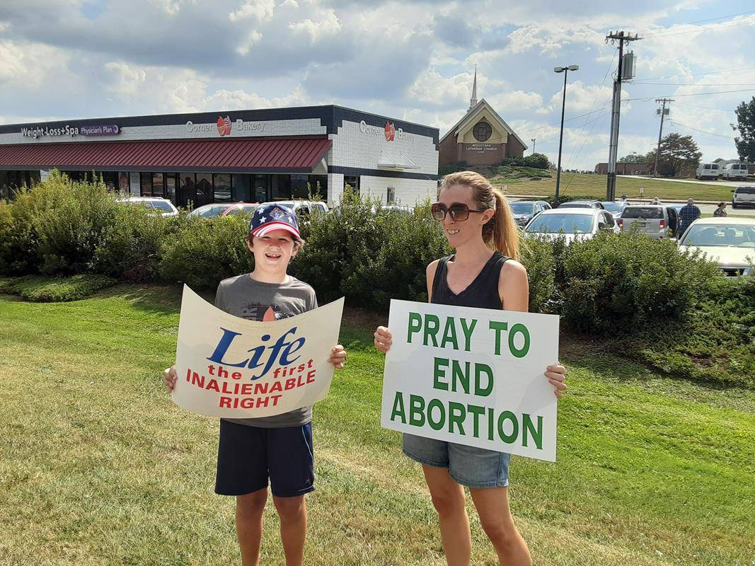 Approximately 100 people gathered along Highway 70 to protest and pray for an end to abortion. The Life Chain participants came from St. Aloysius in Hickory, St. Dorothy in Lincolnton and St. Joseph in Newton. 