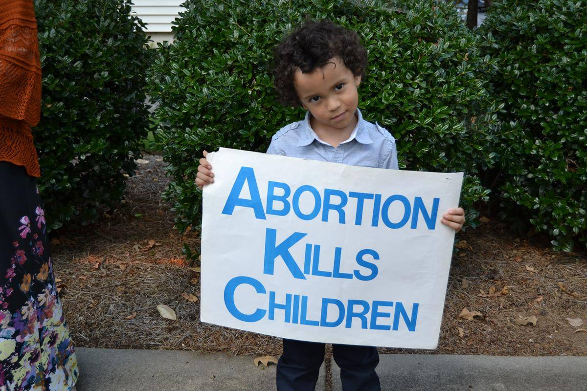 Parishioners gathered outside Holy Cross Church in Kernersville to pray for life on Oct. 3. (Photos by Paul Doizé) 