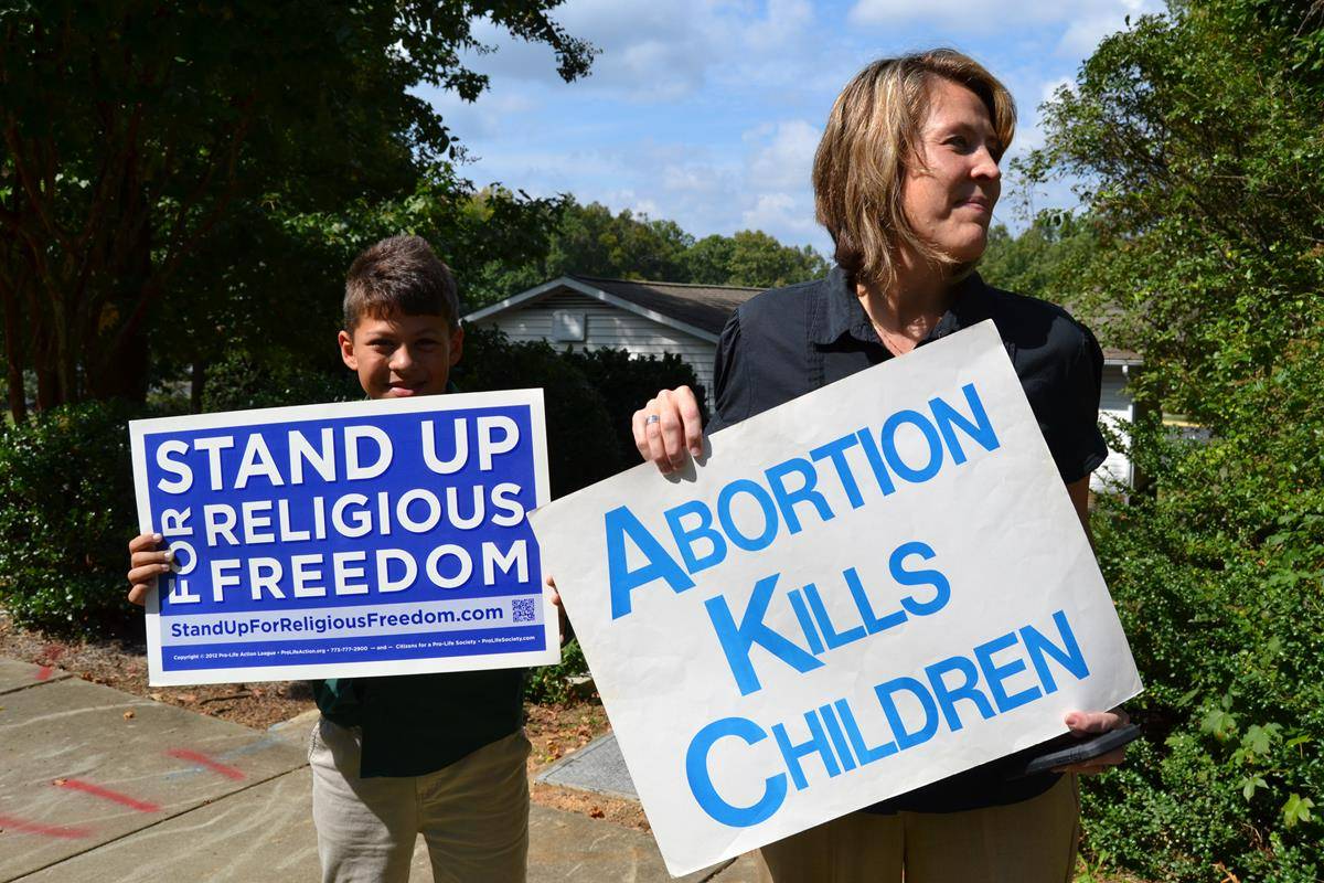 Parishioners gathered outside Holy Cross Church in Kernersville to pray for life on Oct. 3. (Photos by Paul Doizé) 