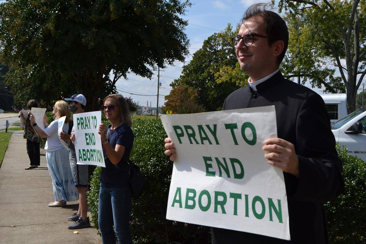 Parishioners gathered outside Holy Cross Church in Kernersville to pray for life on Oct. 3. (Photos by Paul Doizé) 