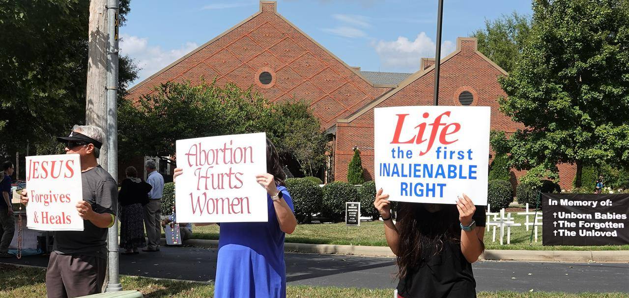 About 175 people formed a Life Chain outside St. Mark Church for Respect Life Sunday, Oct. 3. (Photos provided by Amy Burger)