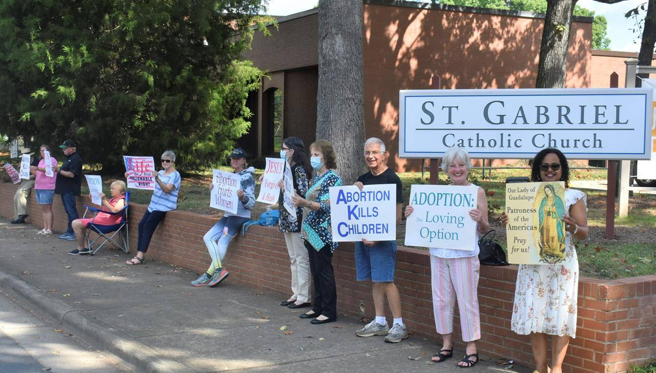 A beautiful, peaceful, prayerful start to Respect Life Month with a Life Chain outside St. Gabriel Church in Charlotte Oct. 3. For the protection of all human life, from conception to natural death, we pray! (Photo by John Ackerman) 