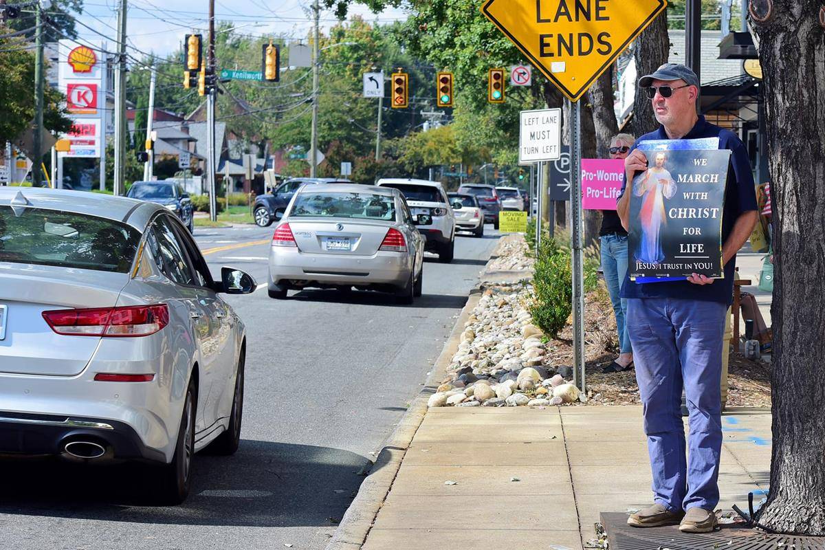 CHARLOTTE — Parishioners and clergy from St Patrick Cathedral participated in a Life Chain prayer vigil along East Boulevard Oct. 3. (Photos provided by James Sarkis)
