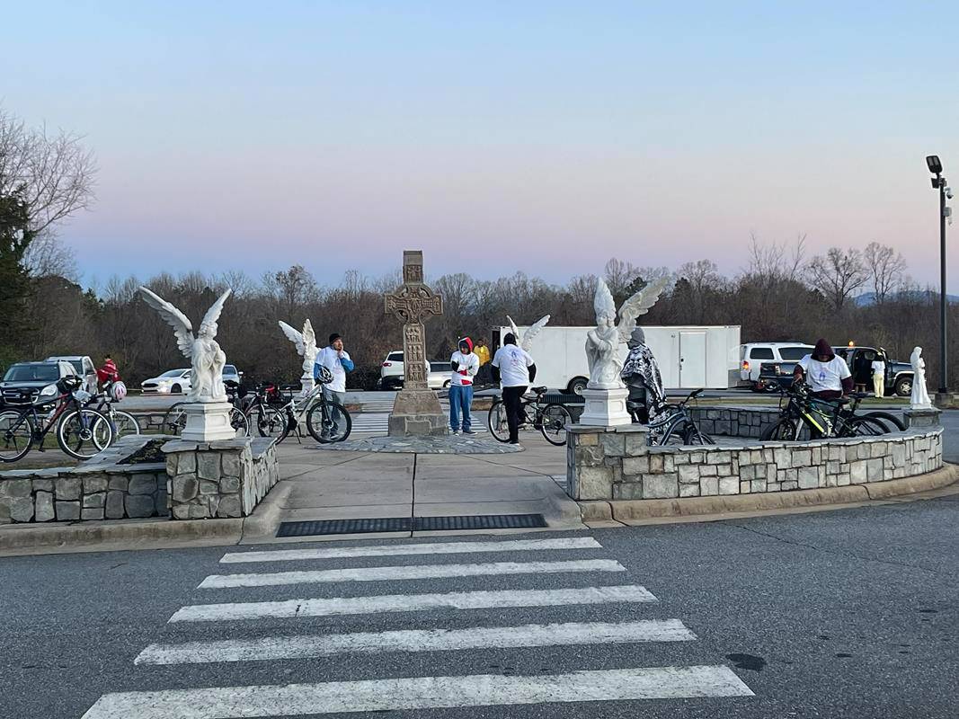 Around 50 men, escorted by police for safety in the dark, left around 1 a.m. and arrived at the Forest City Church prior to the 5 a.m. celebration. (Photos provided by Father Herbert Burke)