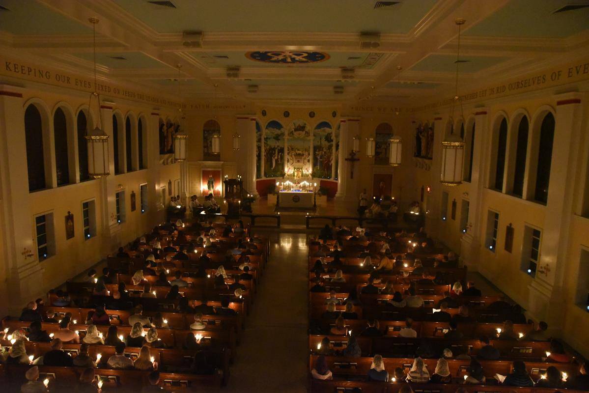 St. Ann parishioners filled the church in the predawn hours for the parish's annual Rorate Mass. (Photo by Markus Kuncoro)
