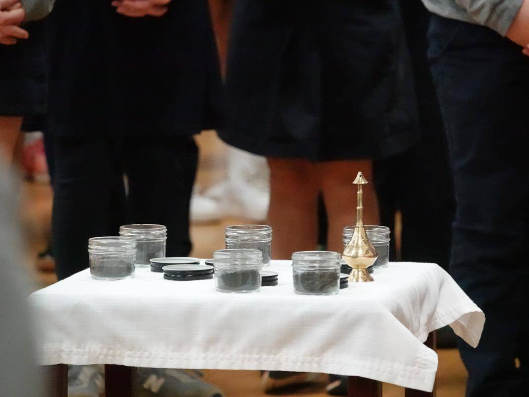 St. Mark School students attend Mass on Ash Wednesday. (Photos by Amy Burger) 