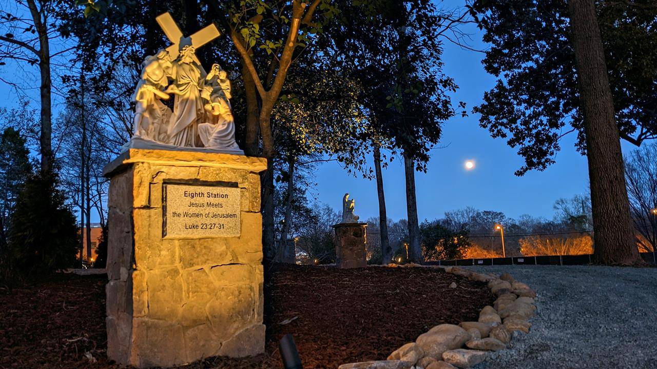 The 14 Stations of the Cross and the 20 Mysteries of the Rosary are nestled behind the Marian grotto adjacent to the Church.