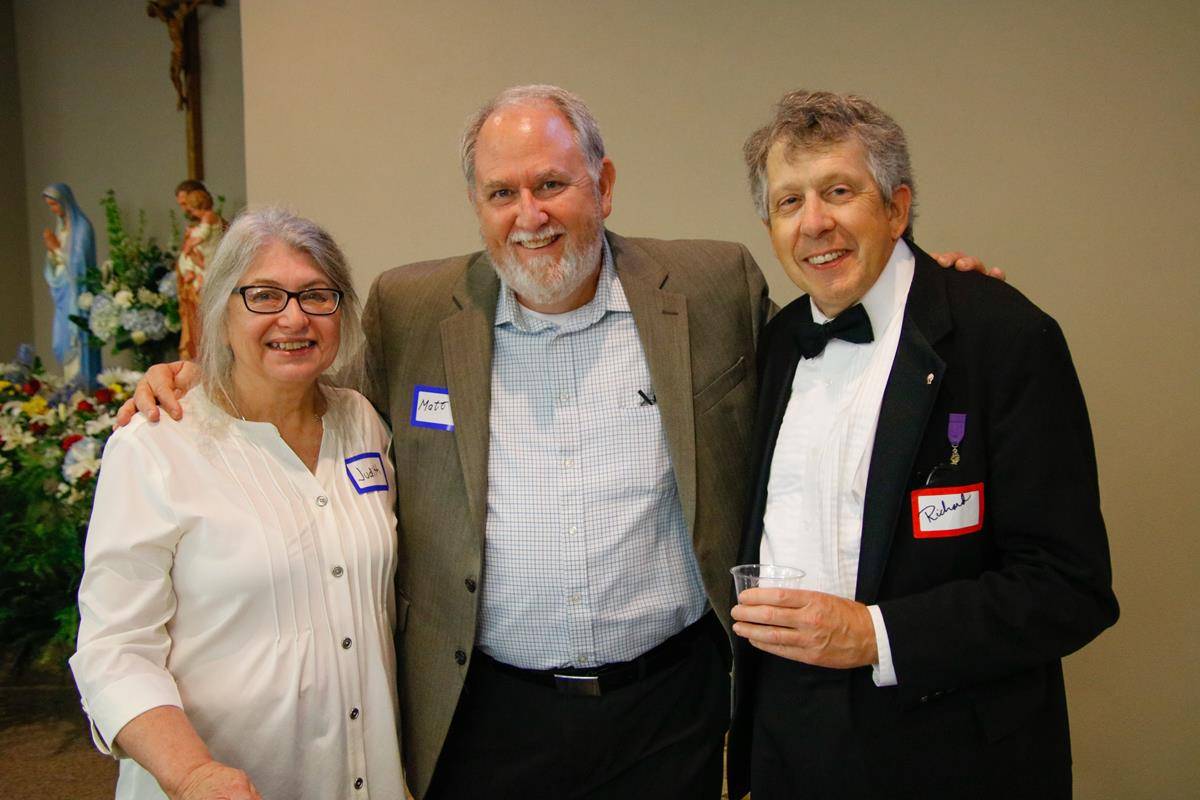 Matt Fitzgerald, Director of Campus Facilities (center), with friends Judith and Richard.
