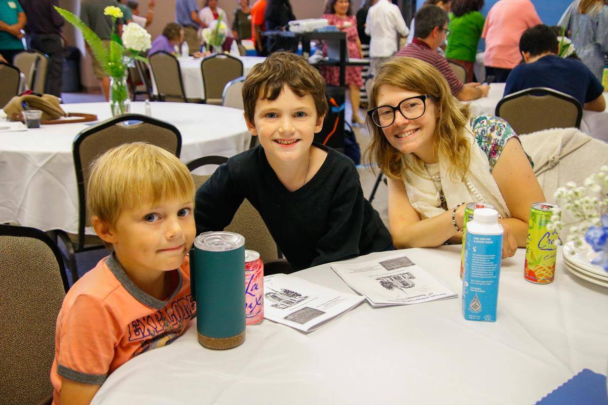 The parish dinner and trivia contest were fun for all ages.