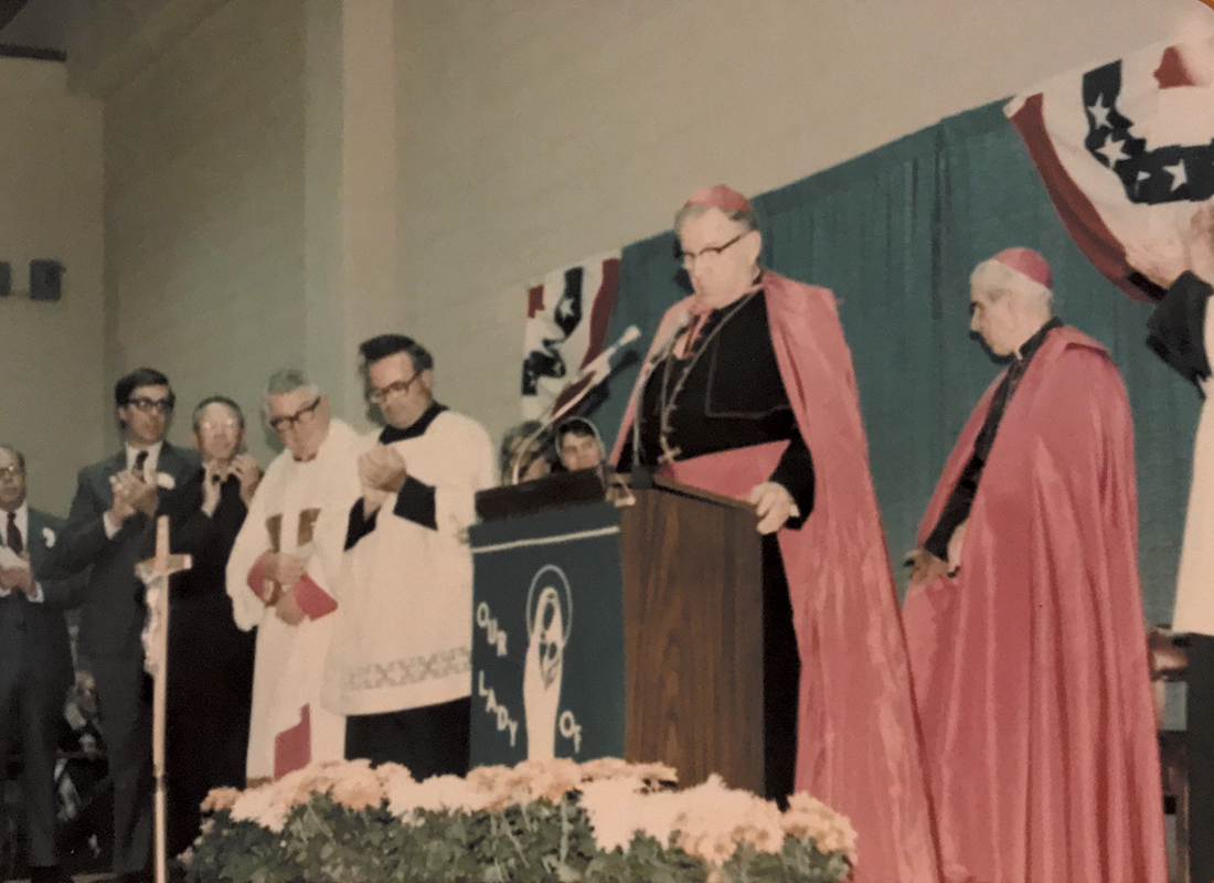 Bishop Michael Begley presides over the dedication of the parish activity center. Bishop Begley was pastor of Our Lady of Grace in 1971 when he was asked to be the first Bishop of the Diocese of Charlotte.