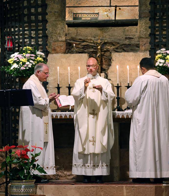 Fr Kottar and Fr Carmen celebrate Mass at the tomb of  St Francis, Assisi