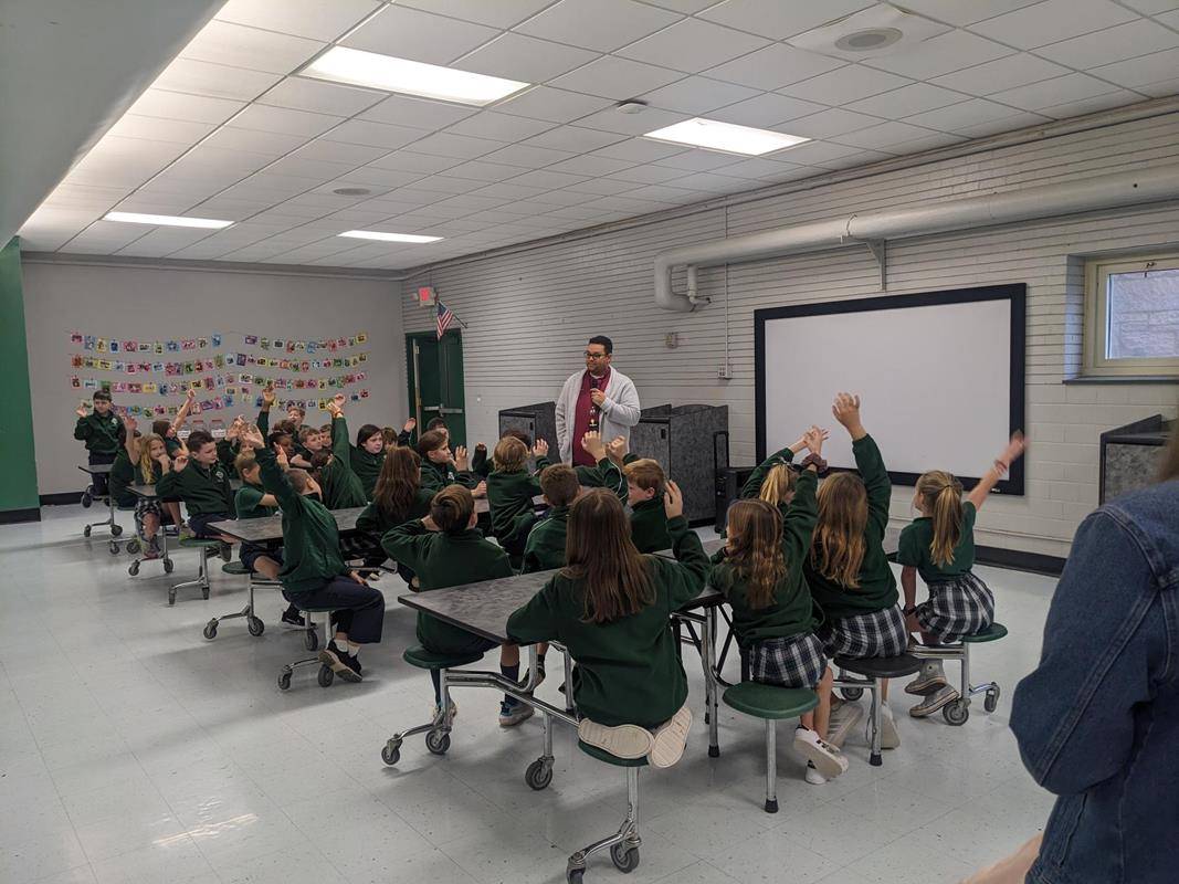 On Tuesday, St. Patrick School first and third graders listened to a guest speaker from Charlotte Rescue Mission. Then they made snack bags and notes for CRM.(Copy)