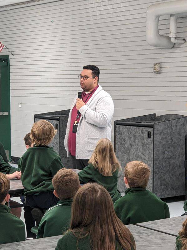 On Tuesday, St. Patrick School first and third graders listened to a guest speaker from Charlotte Rescue Mission. Then they made snack bags and notes for CRM.