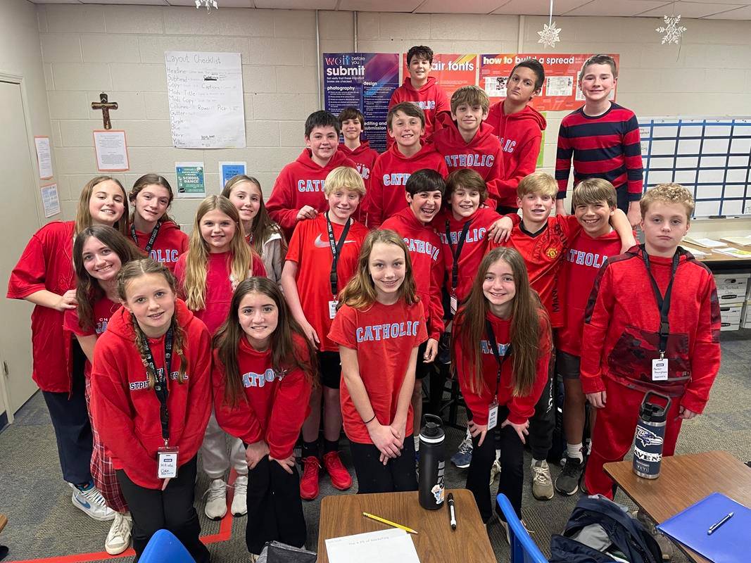 Holy Trinity Middle School students began Catholic Schools Week by celebrating our country and dressed in red (6th grade), white (7th grade), and blue (8th grade). 