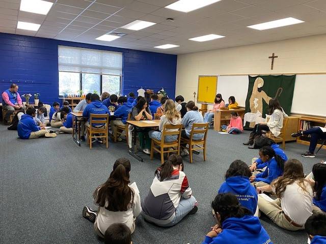  Our Lady of the Assumption School students prayed the rosary.