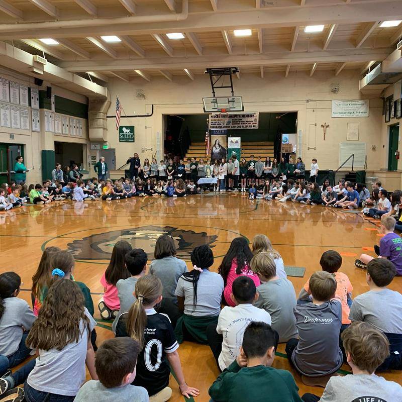 St. Leo School students started Catholic Schools Week with a living rosary praying the Joyful Mysteries.